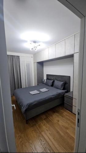 Llit o llits en una habitació de Central Lux