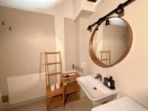 a bathroom with a sink and a mirror at Palazzo Giulietta in Verona