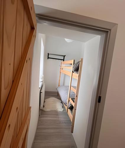 a small room with a bunk bed and a hallway at Bunowen, Louisburgh, Walk to the Beach! in Louisburgh