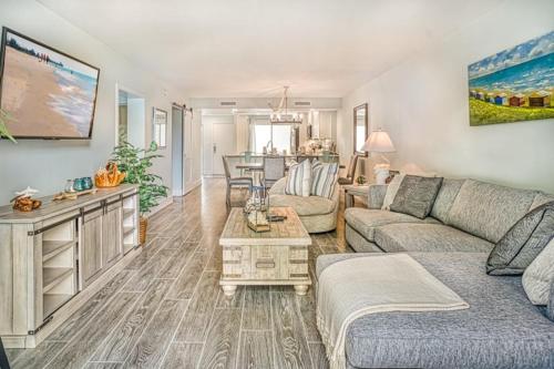 a living room with a couch and a table at Lighthouse Point 222 in Sanibel
