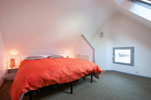 Llit o llits en una habitació de AppartCosy 02