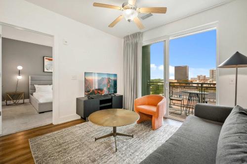 a living room with a couch and a table at 1B1B Midtown Apartment Private Balcony, Views, Gym - 6 in Atlanta