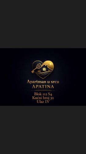 a black and gold logo on a black background at Apartman u srcu apatina in Apatin