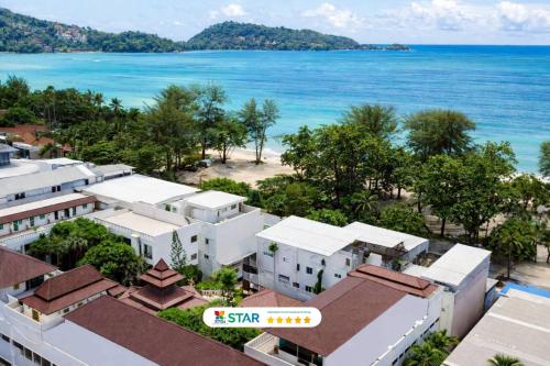 an aerial view of the beach and buildings at Quality Beach Resorts and Spa Patong in Patong Beach