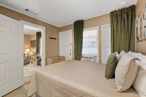 a bedroom with a large bed in a room at A Cedar Key Dock Holiday! in Cedar Key