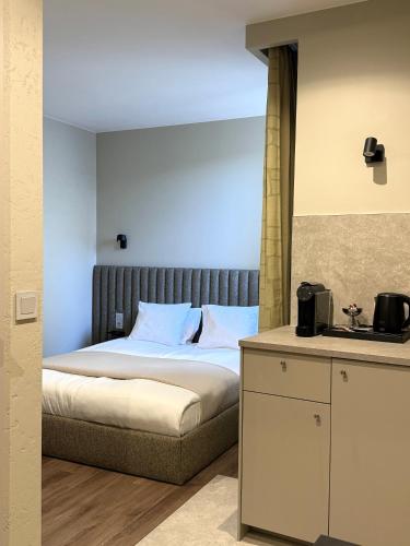 Postel nebo postele na pokoji v ubytování Apartamenty Delecta