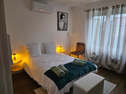 Llit o llits en una habitació de Chez Anna