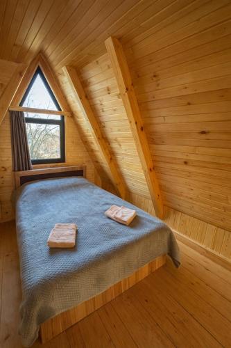 Llit o llits en una habitació de Jacuzzi Dream House