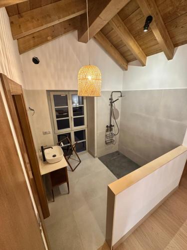 a room with a desk and a lamp in a room at Casa Rural As Bodegas - Villa Rustica Asturias - Boal in Boal