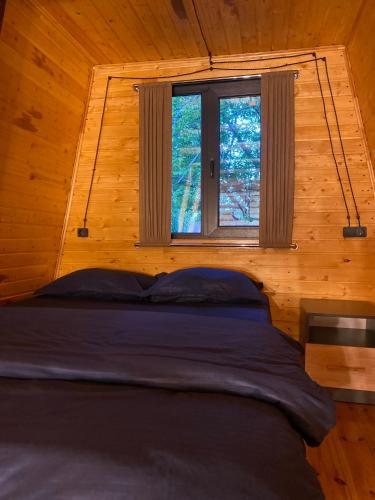 Cama ou camas em um quarto em Eco Yard Inn