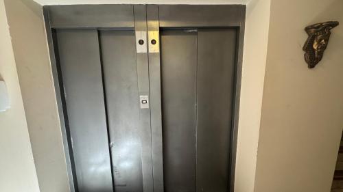 a pair of metal lockers in a room at Wilson Hotel in Salta