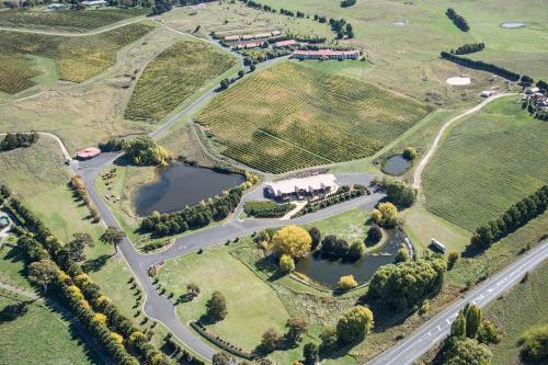 an aerial view of an estate with a lake at Turners Vineyard Motel in Orange