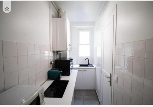 Køkken eller tekøkken på Appartement eiffel tower