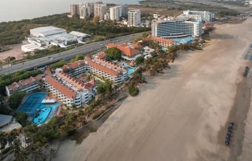 an aerial view of a resort on the beach at Hotel Las Americas Casa de Playa in Cartagena de Indias