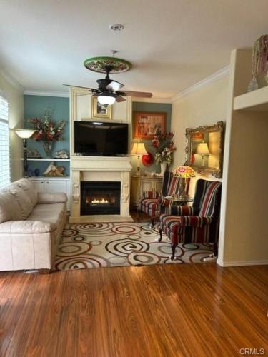 a living room with a couch and a fireplace at The Cozy Coast Nest in Oceano