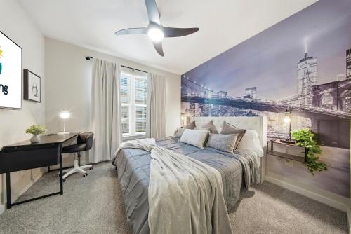 a bedroom with a bed and a desk at Stylish 2BR w Balcony, Pool & Pet-Friendly #15 in Tampa