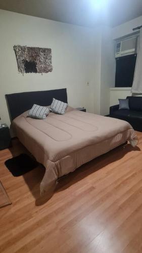 Llit o llits en una habitació de Monoambiente céntrico 02