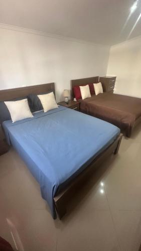 Кровать или кровати в номере Natflor