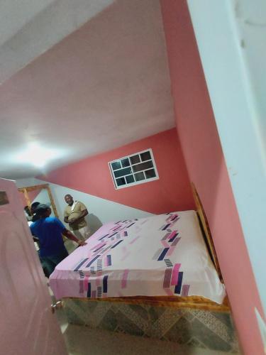 Llit o llits en una habitació de BAYO HOTEl