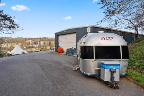 a trailer parked on the side of a road at Airstream in Art's District in Asheville