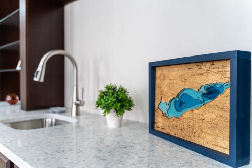 a kitchen counter with a picture of a map on it at The Inn Down Town in Erie
