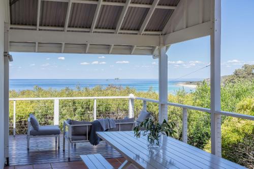 a view of the ocean from the porch of a house at Sea Spell I Private Properties in Dunsborough