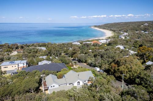 an aerial view of a house and the beach at Sea Spell I Private Properties in Dunsborough