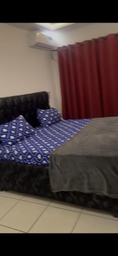 Llit o llits en una habitació de Prestiges immobilier