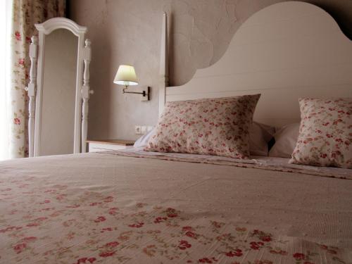 מיטה או מיטות בחדר ב-Hotel Bella Hellín