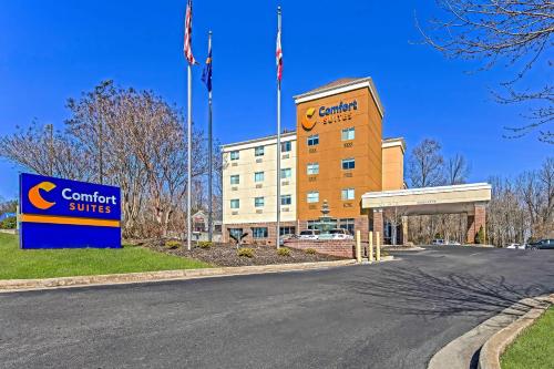 a building with a sign for a comfort suites at Comfort Suites Huntsville MidCity District at Research Park in Huntsville