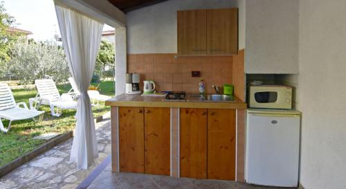 Cozy flat with garden access in Umag