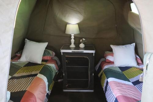 Llit o llits en una habitació de Kora Orab Camping