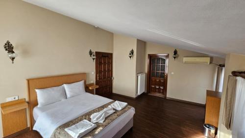Ліжко або ліжка в номері Ottoman Elegance Hotel