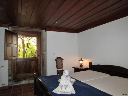 เตียงในห้องที่ Casa Do Pomar