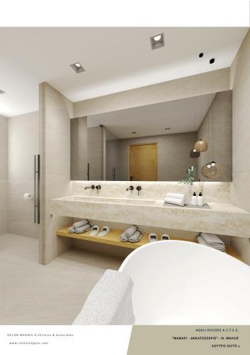 a bathroom with a sink and a large mirror at Agali Hotel Milos in Adamantas