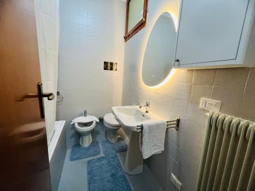 a bathroom with a sink and a toilet at Suite Semeria 236 - Vista mare Sanremo in Sanremo