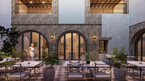 a rendering of a restaurant with tables and chairs at Aria Santa Maria in Santo Domingo