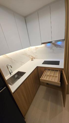 a kitchen with a sink and a counter top at Azure Urban Resort Residences St Tropez Tower Near SM Bicutan with Wave Pool in Manila