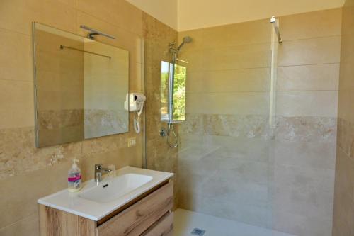 a bathroom with a sink and a shower at Villa Melina Bed & Breakfast in Agropoli