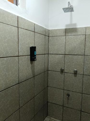 a bathroom with a shower with a soap dispenser at casa bajlum in Valladolid