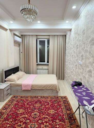 Postel nebo postele na pokoji v ubytování DownTown