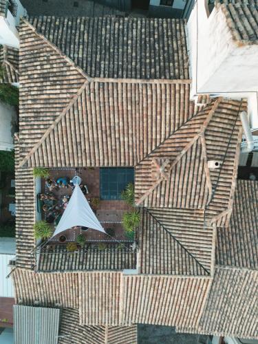 an overhead view of a house with a roof at Oasis Backpackers' Hostel Granada in Granada