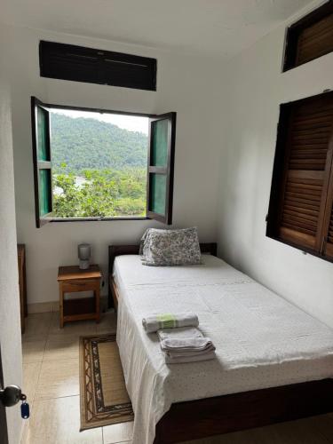 En eller flere senge i et værelse på Londé