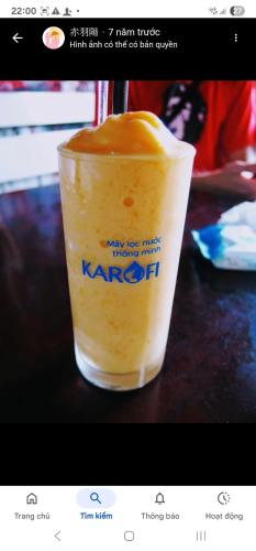 a drink in a cup on a table at Le Condor House and Café in Con Dao