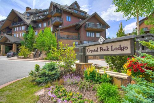 a sign in front of a large building at Crystal Peak Lodge, A Vail Resorts Property in Breckenridge