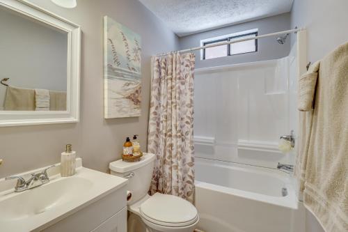 a bathroom with a toilet and a sink and a shower at Contemporary House in Lakeside Community! Poconos in Albrightsville