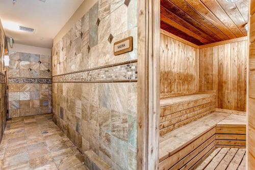 a sauna with wooden walls and a wooden ceiling at Keystone Lodge & Spa, A Vail Resorts Property in Keystone