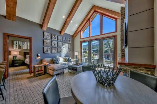 a living room with a table and a couch at Zalanta, A Vail Resorts Property in South Lake Tahoe
