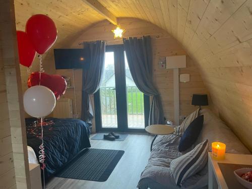 a room with a bed and balloons in a room at Mountain View in Tipperary