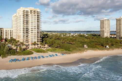 an aerial view of the beach and buildings at Palm Beach Marriott Singer Island Beach Resort & Spa in Palm Beach Shores